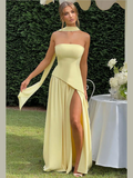 "Elegant yellow ribbon dress with flattering design for special occasions"